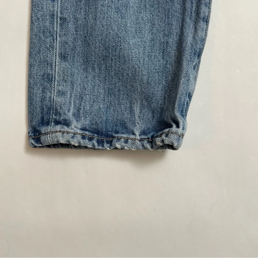 LEVI’S 511 distressed jeans